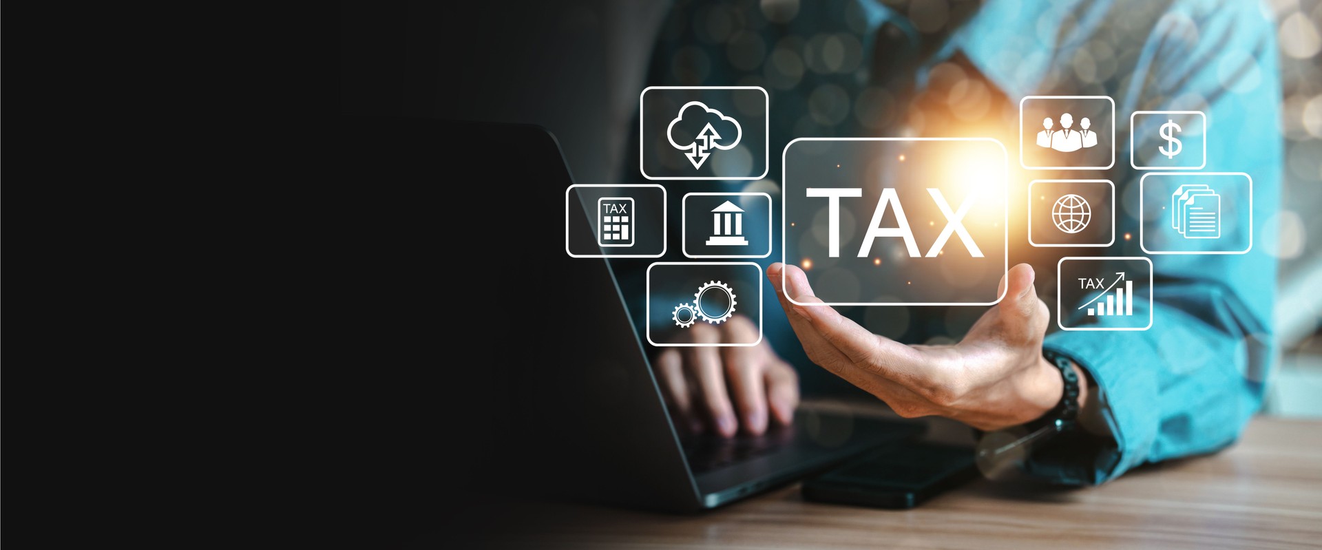 Businessman using computer to fill out income tax refund form Enter the online tax form to pay taxes. state tax government Data analysis, documents, financial research, reports, tax return calculation concepts.